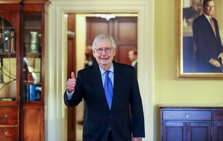 Mitch McConnell addressing reporters before a Senate meeting.