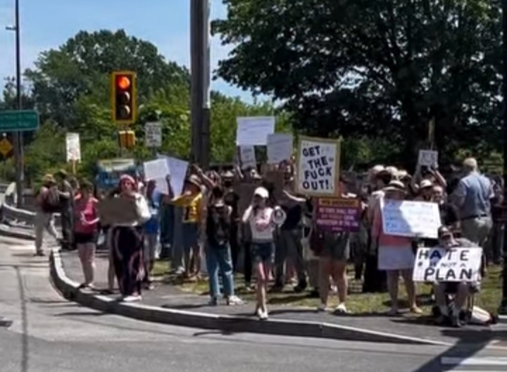 Community members gather for a vigil after the Biddeford, Maine ICE shooting