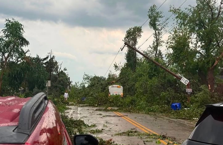 Tornado damage in Appleton Wisconsin with fallen trees and damaged homes.