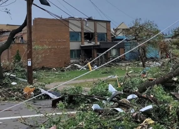 Tornado damage in Appleton Wisconsin with fallen trees and damaged homes.