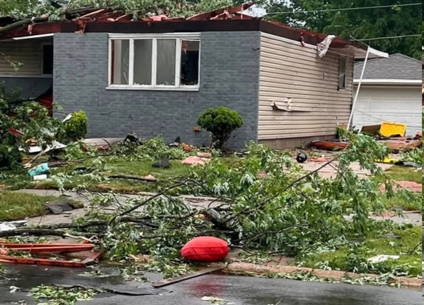 Power crews repairing damaged utility lines after the Appleton tornado.