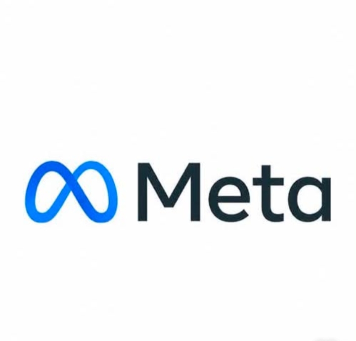 Meta Platforms logo with falling stock market chart