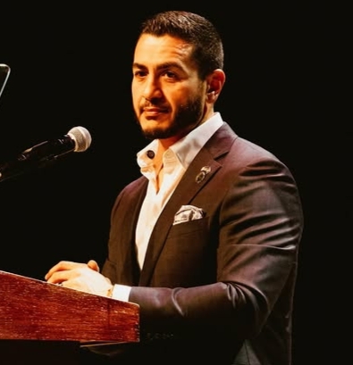 Abdul El-Sayed addressing supporters after winning a closely contested election race.