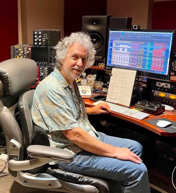 Tommy Detamore performing pedal steel guitar in the Texas country music scene