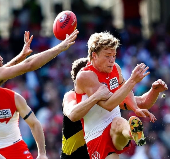 Isaac Heeney playing for the Sydney Swans in an AFL match